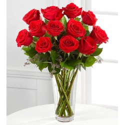 Red roses in a glass vase